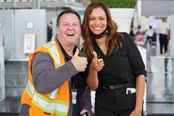 Deborah Flint posing with an employee at the I Am Toronto Pearson Thank You event