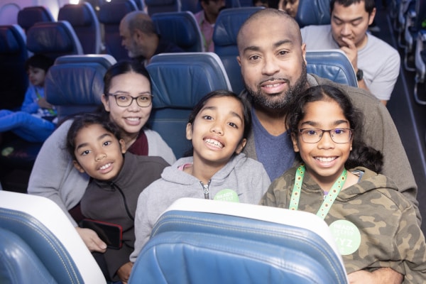 a group of people sitting in a stadium