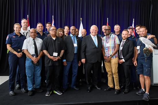 a group of men posing for a photo