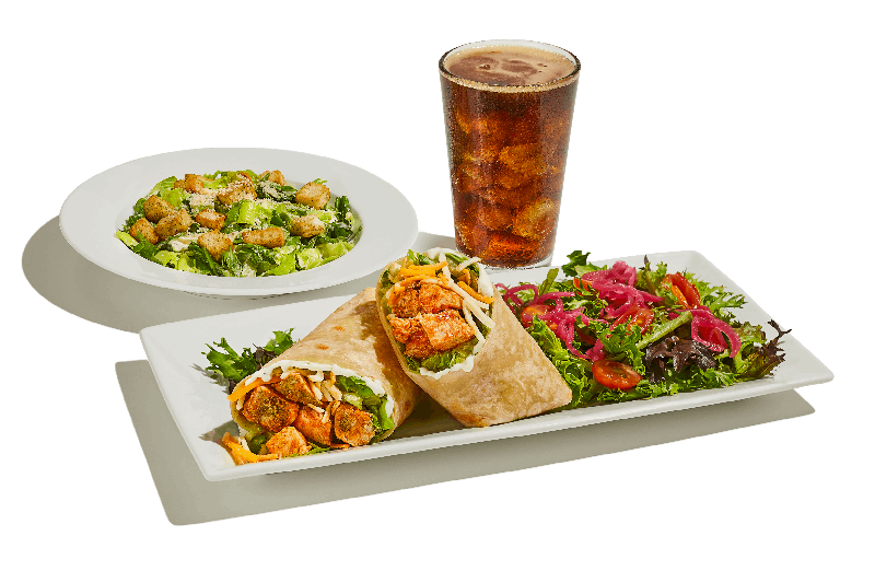 Buffalo chicken wrap with Caesar salad.