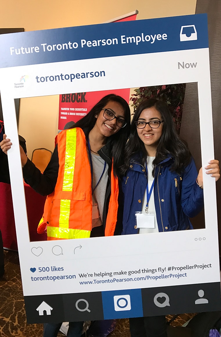 Two students attending a Propeller Project event