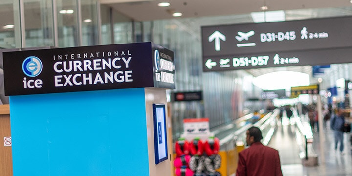 International Currency Exchange kiosk sign.