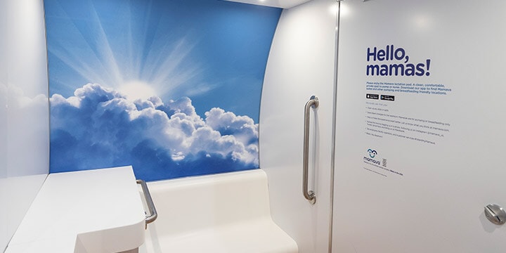 Inside of Mamava nursing pod with seat and changing table. 