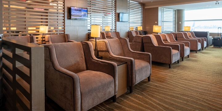 Rows of plush club chairs in lounge. 