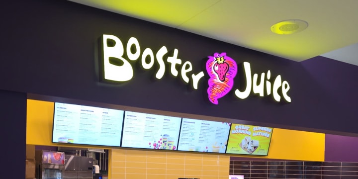 a sign with writing on it