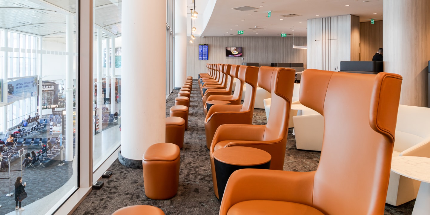 a room with chairs and tables