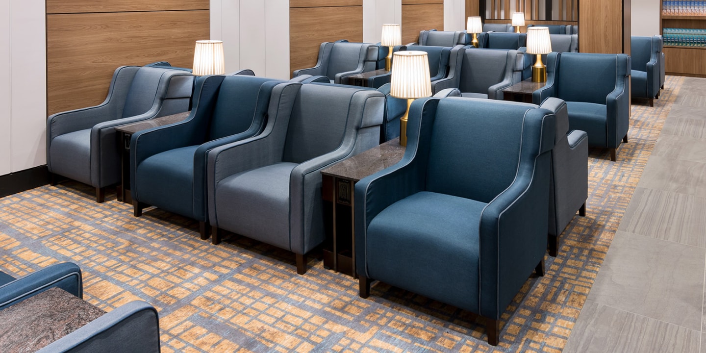 a room with chairs and tables